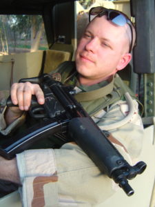 Doc with MP5 in convoy humvee